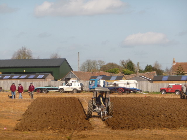 tractor plowing field soil preparation