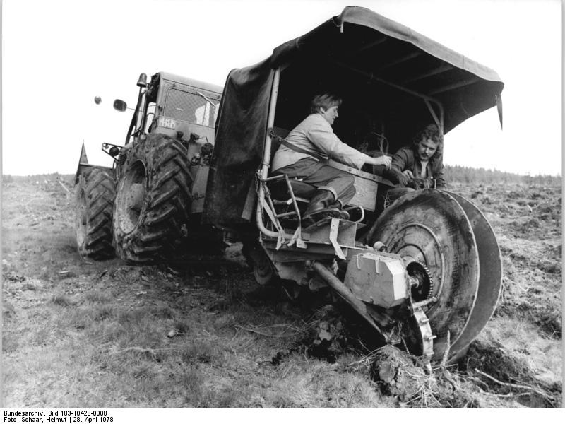 tractor planting saplings