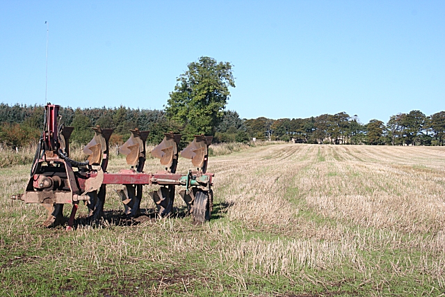 plow in harvested field