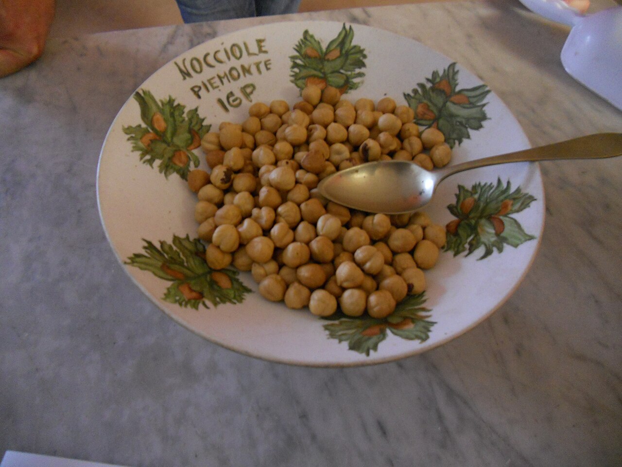 Plate of hazelnuts with label
